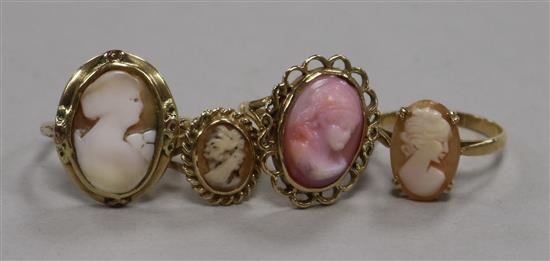 Four assorted 9ct gold and oval cameo rings, gross 11.9 grams.